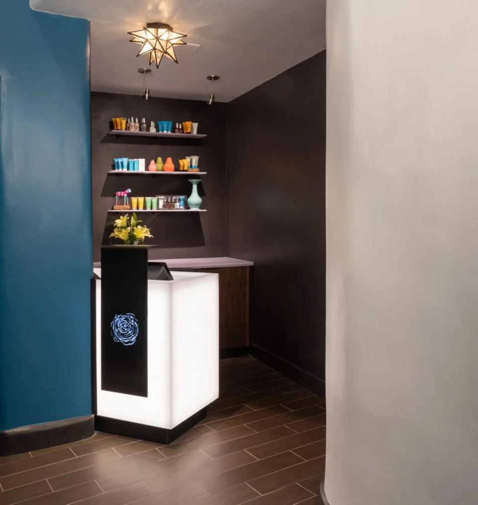 Modern reception area with shelves and lighting