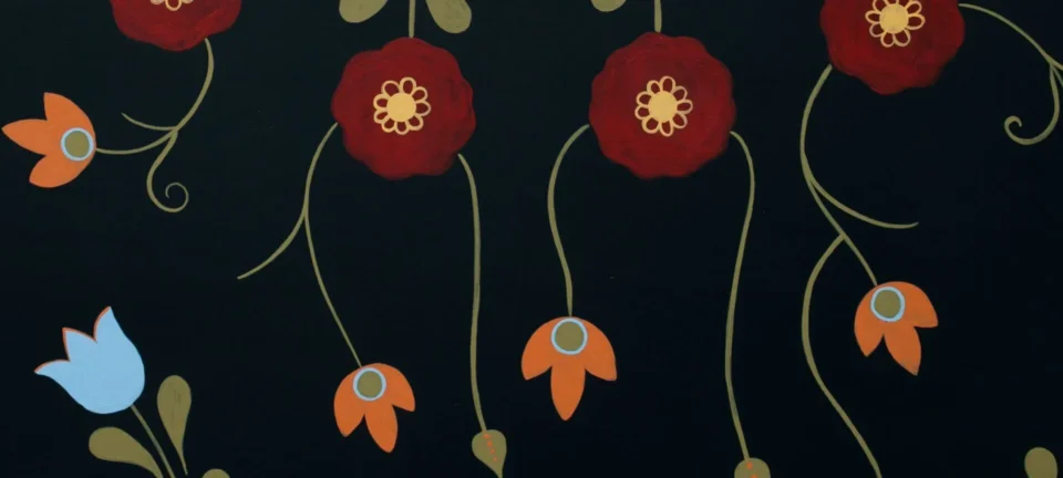 A striking hand-painted wall mural features stylized red, orange, and blue flowers against a dark black background.