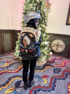 woman in a leather jacket.