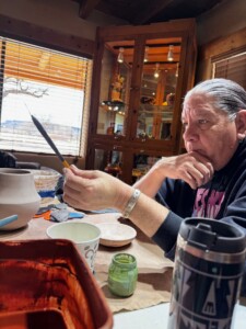 Erik Fender showcasing his pottery method.