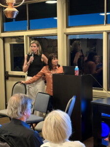 Jenny Kimball presenting a slideshow.