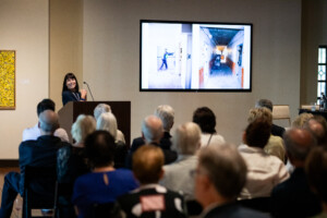 Jenny Kimball presenting a Fred Harvey slideshow.