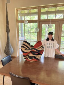 Jenny Kimball standing near a basket.