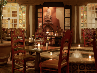 A Dining Room Table With Candles On It