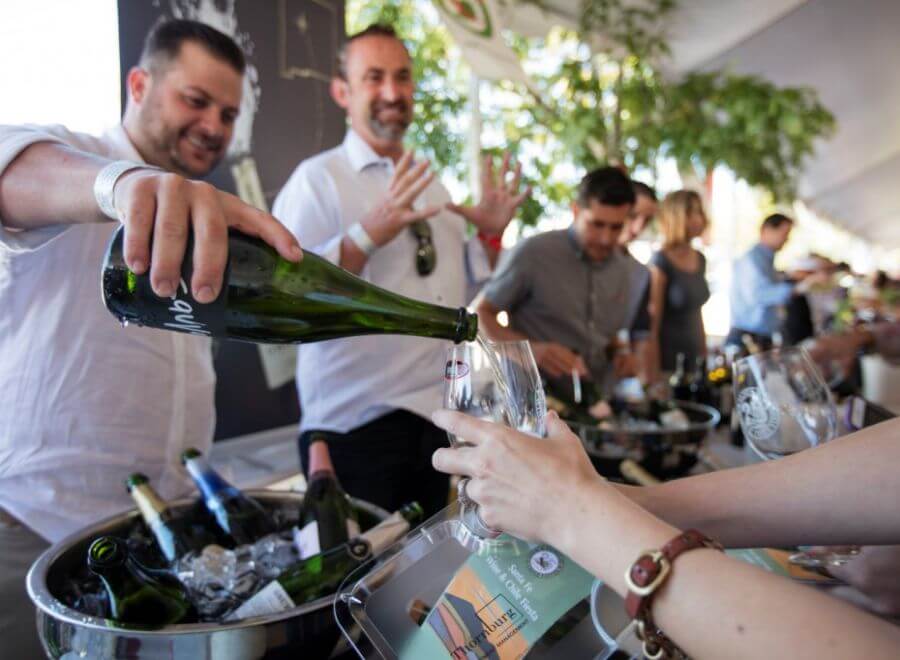 Wine being poured at Santa Fe Wine & Chile Fiesta.