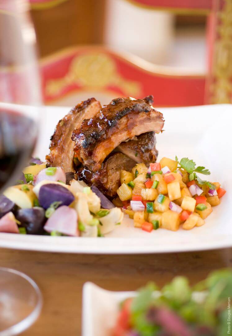 Enjoy this flavorful dish of glazed pork ribs and sides available at our downtown santa fe restaurants.