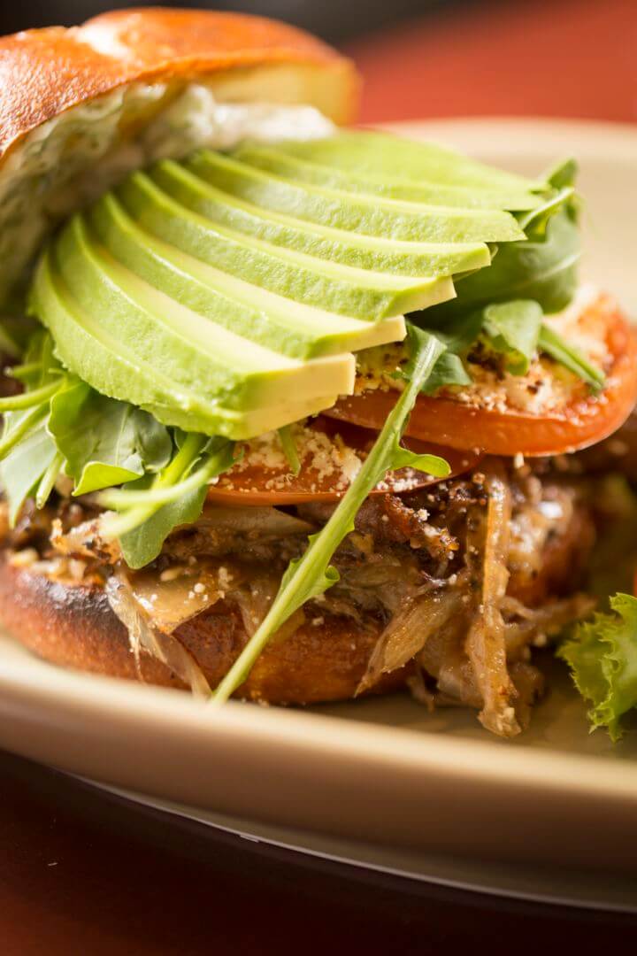 This savory sandwich, featuring layered avocado and arugula, is served at our downtown Santa Fe restaurants.