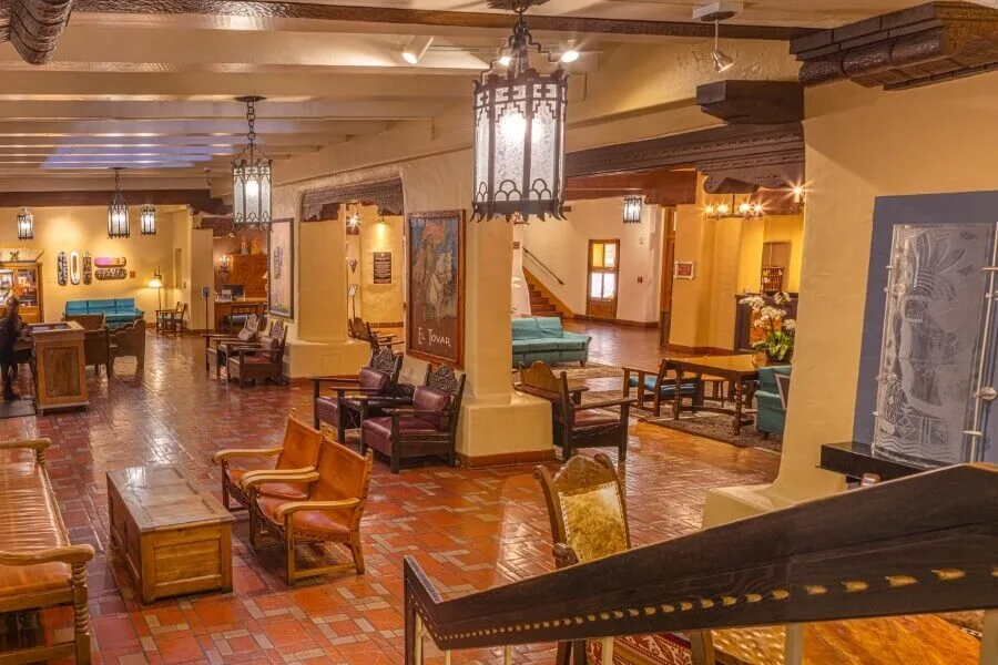 The warm, historic lobby lounge showcases traditional exposed beams and territorial style decor.