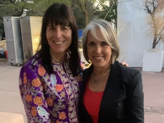 Jenny Kimball, Michelle Lujan Grisham Are Posing For A Picture