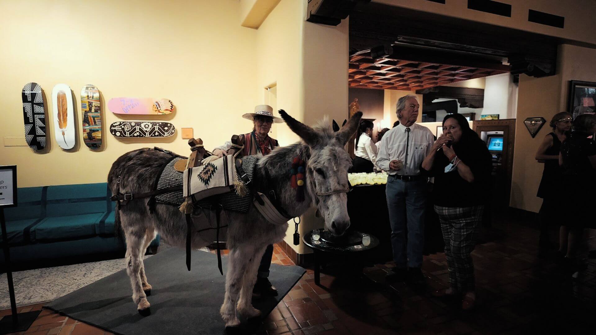 A beautifully saddled burro greets guests inside the unique hotel event area.