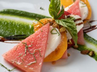 A Plate Of Food With A Slice Cut Out