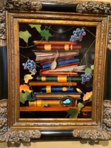 hand painted art work by Cynde Roof. Painting of books.