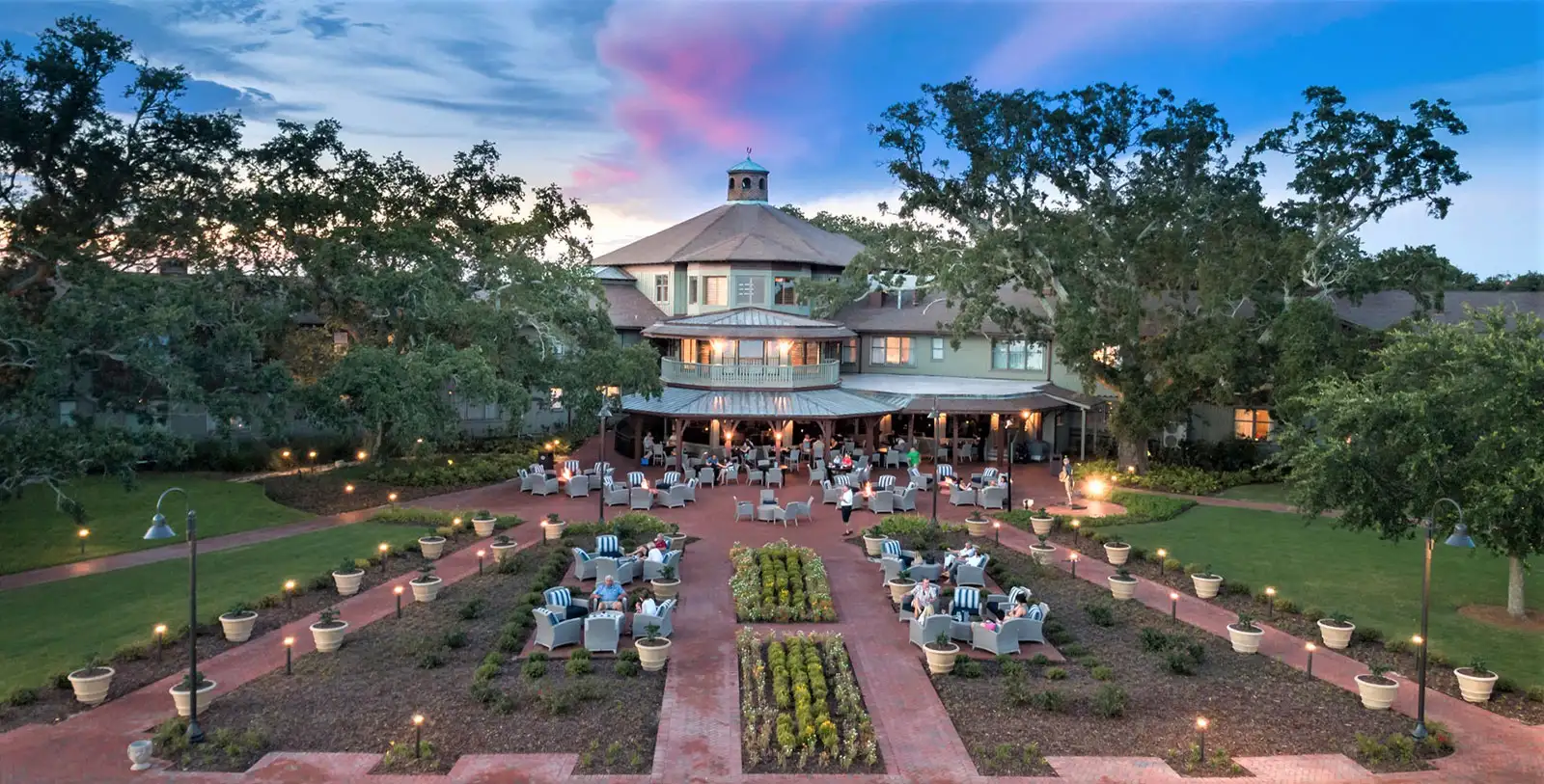 The extensive outdoor brick courtyard provides beautiful event spaces in Santa Fe NM for evening gatherings.